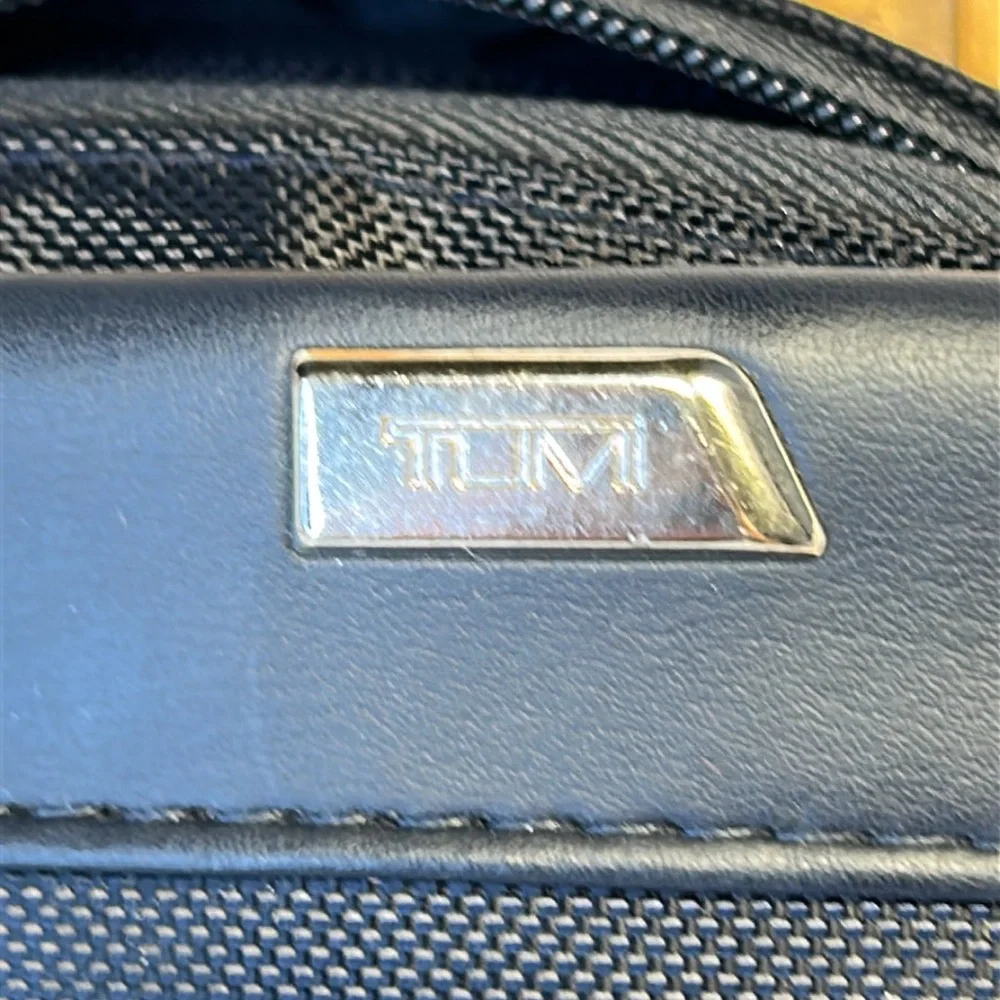 Tumi NWT cosmetic travel bag filled with goodies all new in packages